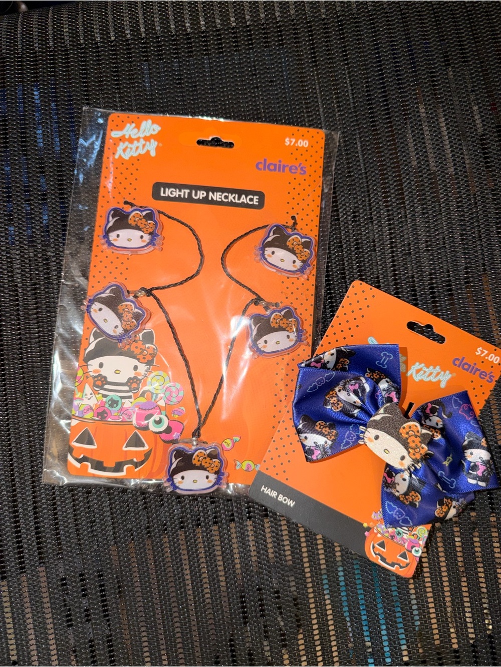 Hello Kitty x Claireโs Halloween light up necklace and hair bow